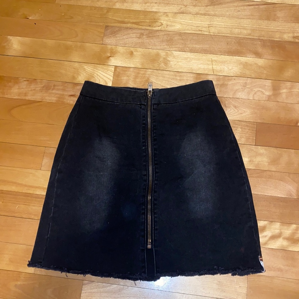 Black high waisted jean skirt with zipper down the middle